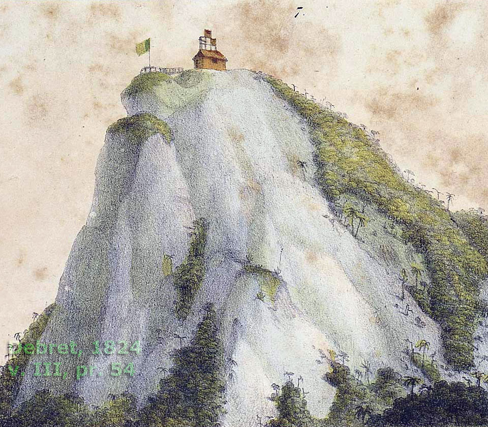 Detalhe ampliado do pico do Corcovado, com a cabana de telegrafia (sinalização ótica) e pontilhão de acesso ao bloco de granito cercado por um parapeito